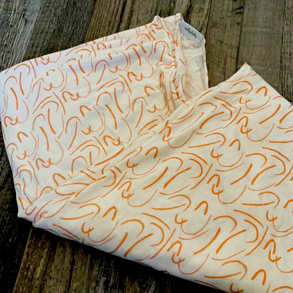 Like new without tags Jenny Pennywood Solly baby wrap, worn a handful of times.